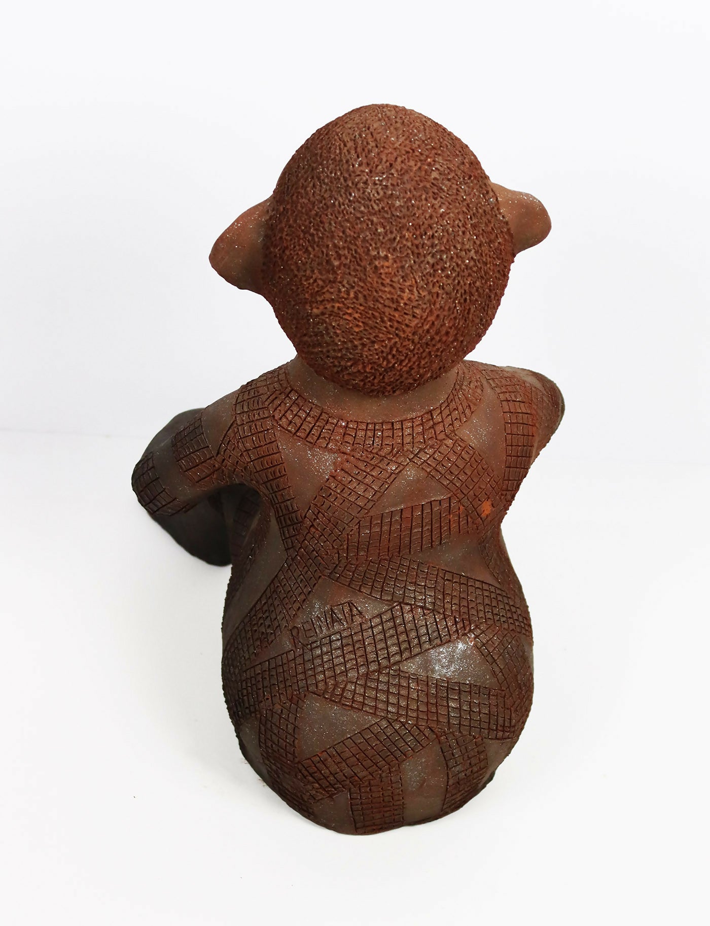 Reinata-escultura-costas