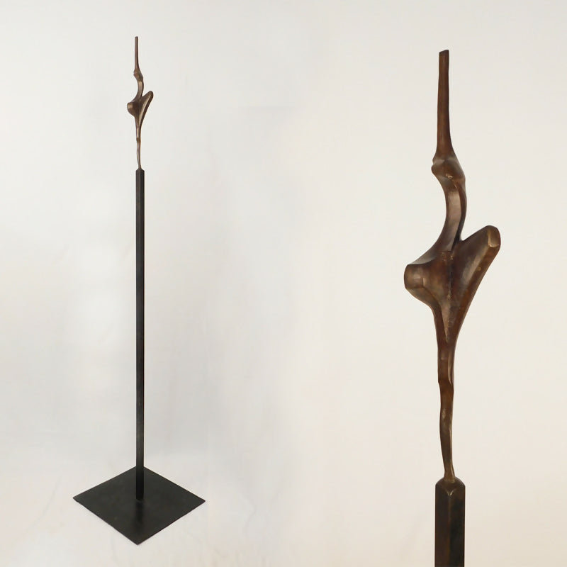 Balanza 151 x 32,5 x 32,5 cm., bronce y acero